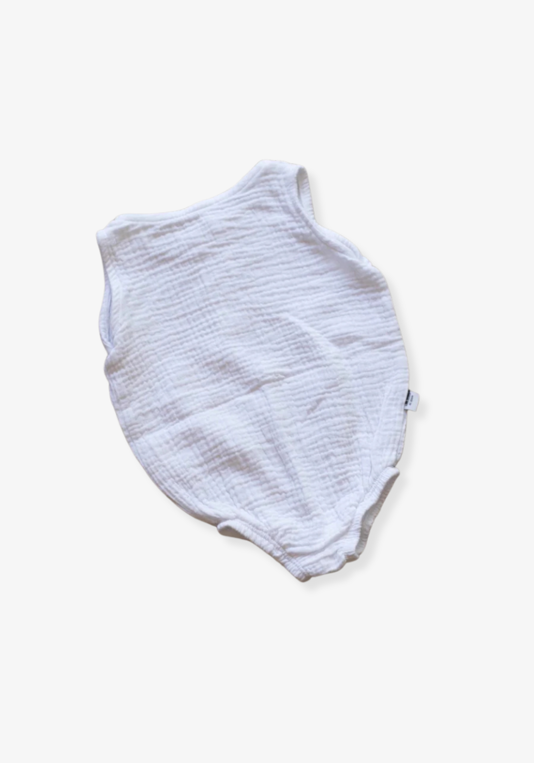 White organic cotton baby romper with three snap buttons and elasticised leg bands