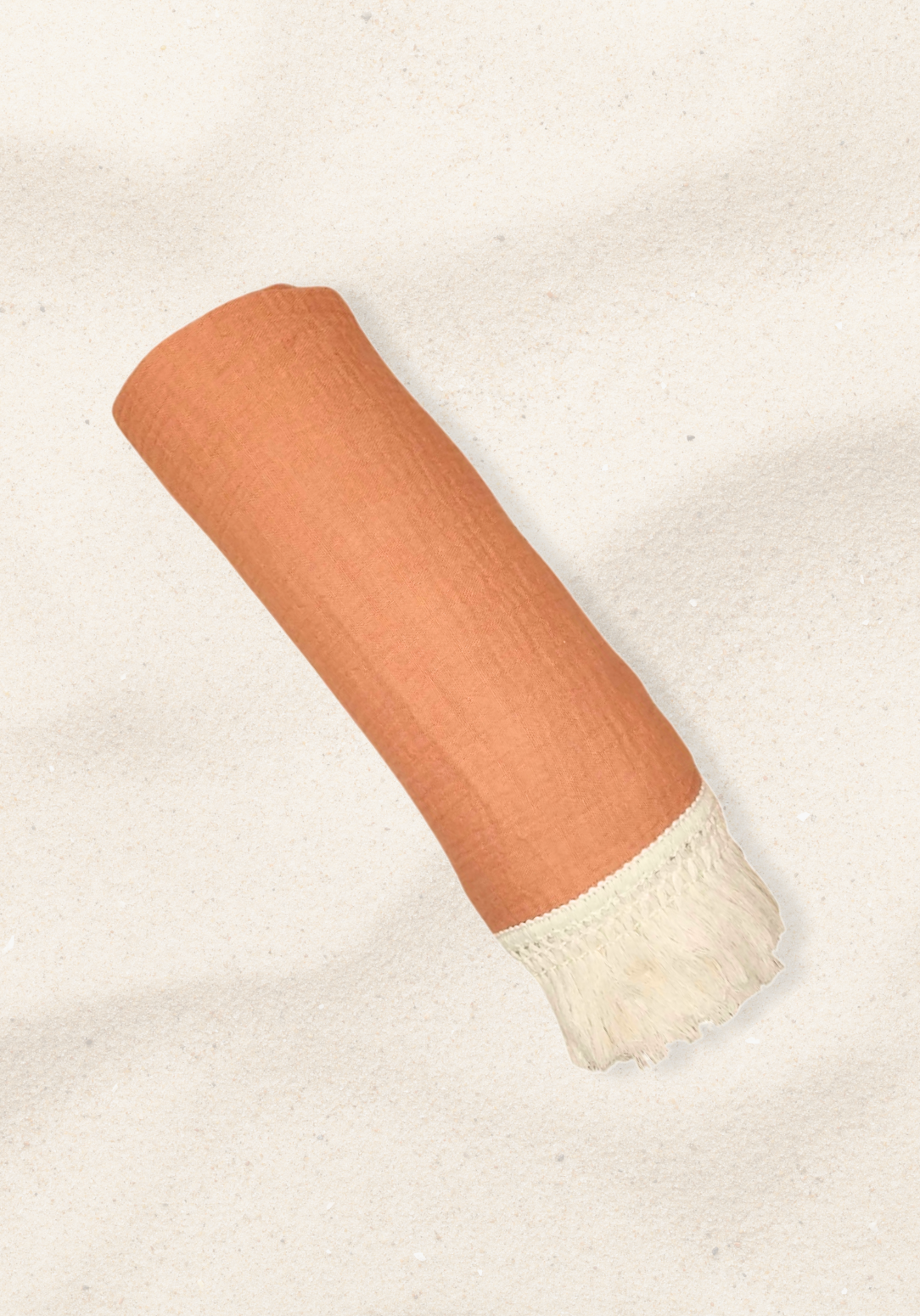Solid terracotta baby blanket made of soft cotton bamboo fabric with vintage cream fringe detailing.