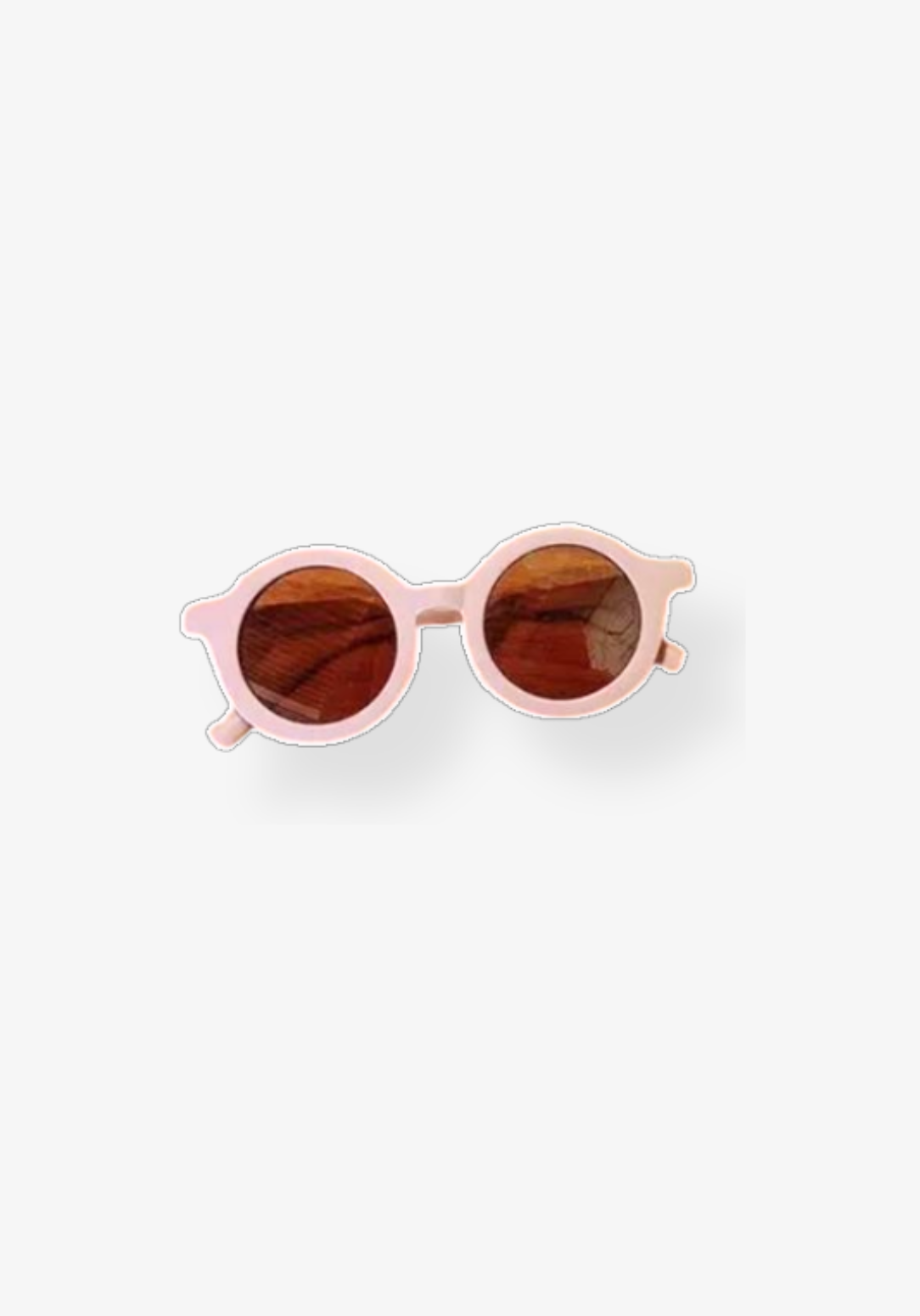 Baby pink toddler sunglasses with rounded amber lenses and soft pastel frame.