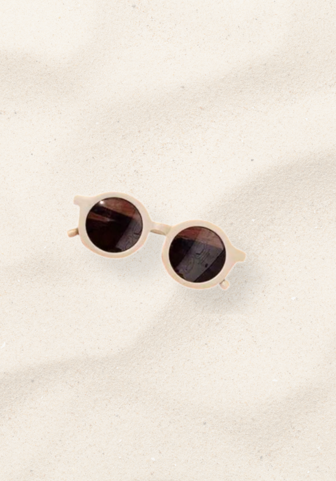 Vanilla cream toddler sunglasses with smooth round lenses and soft off-white frame.