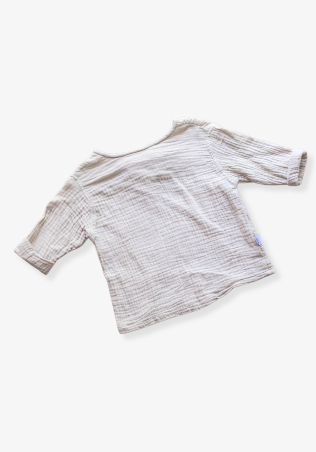 Beige long sleeve baby pirate shirt made from organic cotton with soft gathered neckline