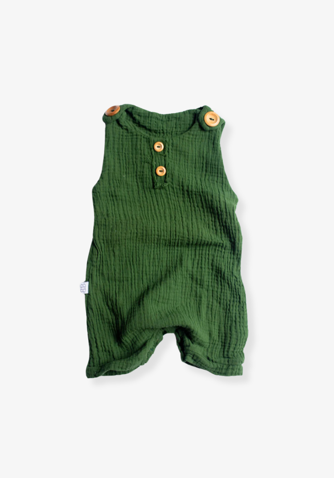 Baby romper in deep green organic cotton with overall-style wooden button straps