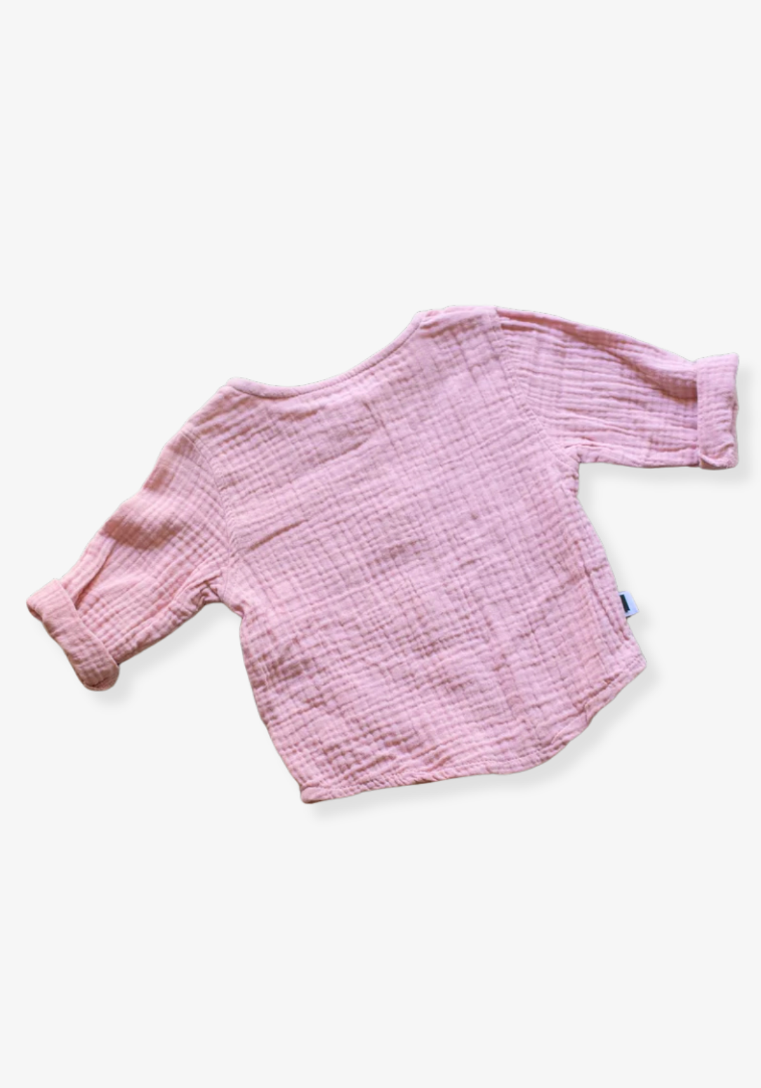 Dusty pink baby and toddler island-style shirt made from organic cotton with short sleeves and wooden buttons