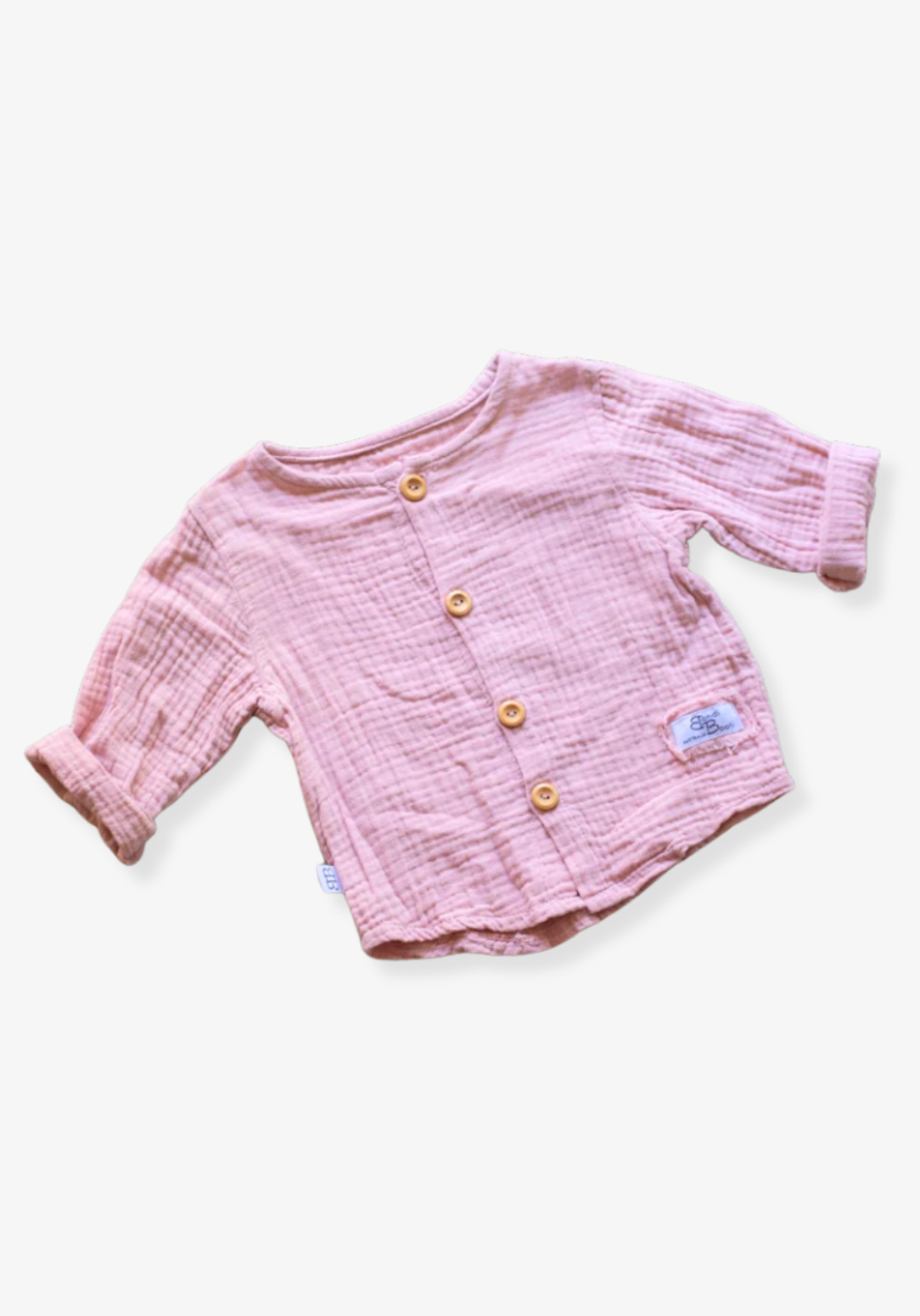 Dusty pink baby and toddler island-style shirt made from organic cotton with short sleeves and wooden buttons
