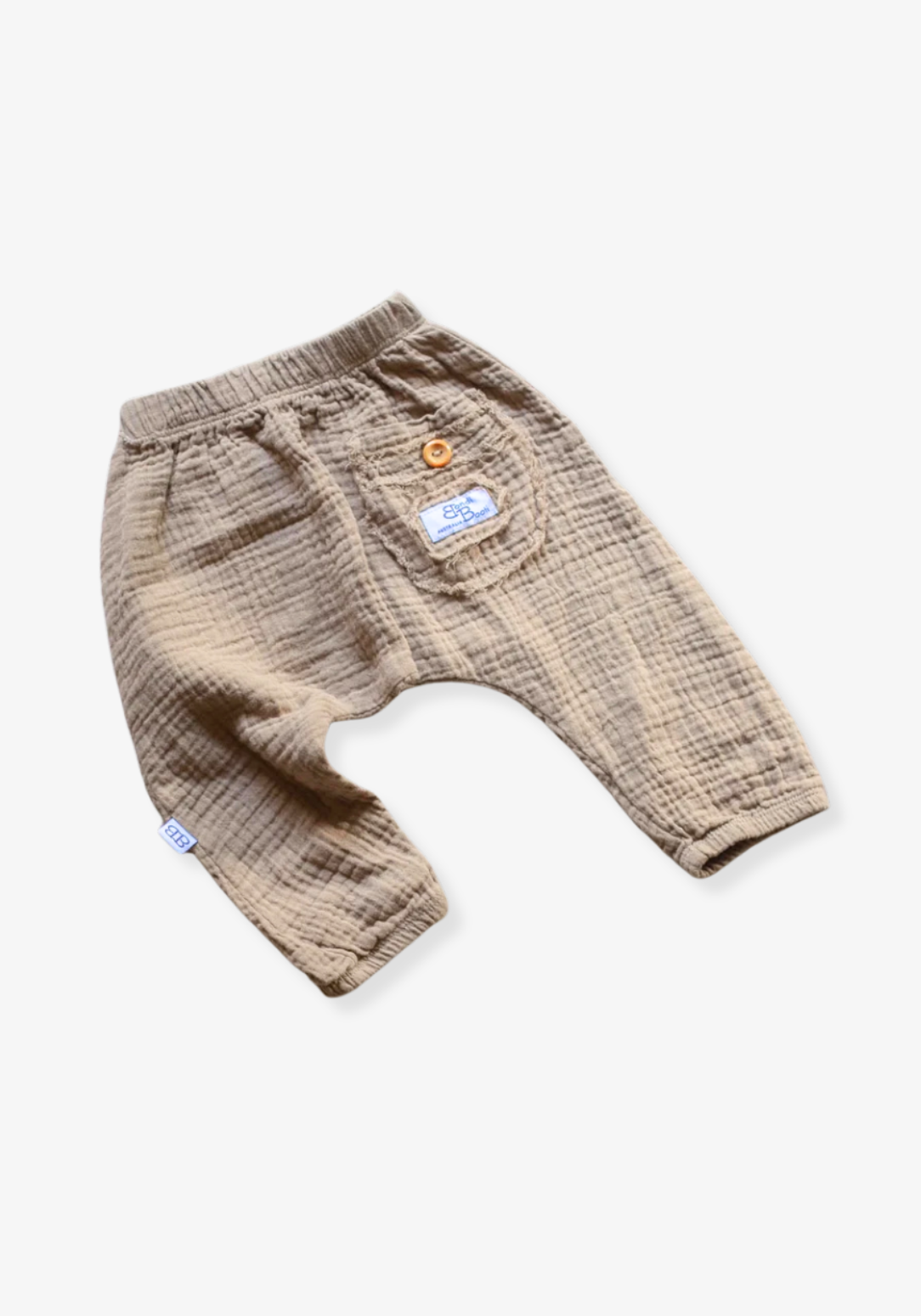 Soft mocha toddler harem pants made from breathable organic cotton with stretchy waistband and ankle cuffs.