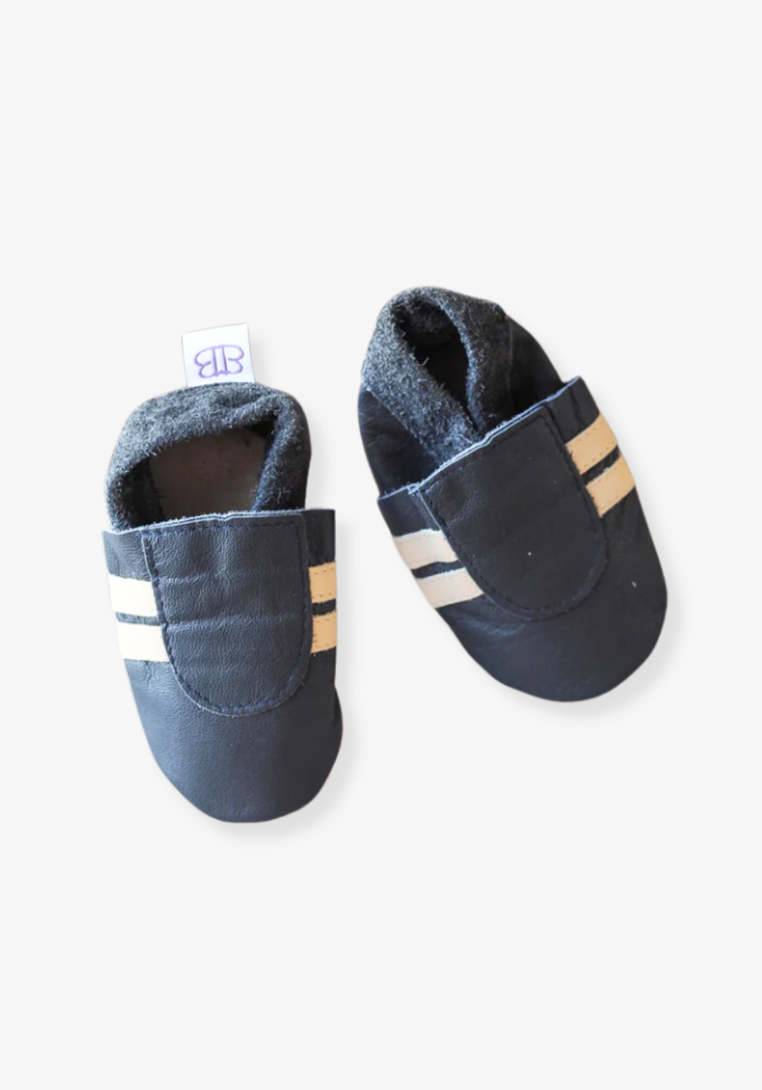 Leather soft sole baby booties in navy and cream with elastic ankle and non-slip suede soles