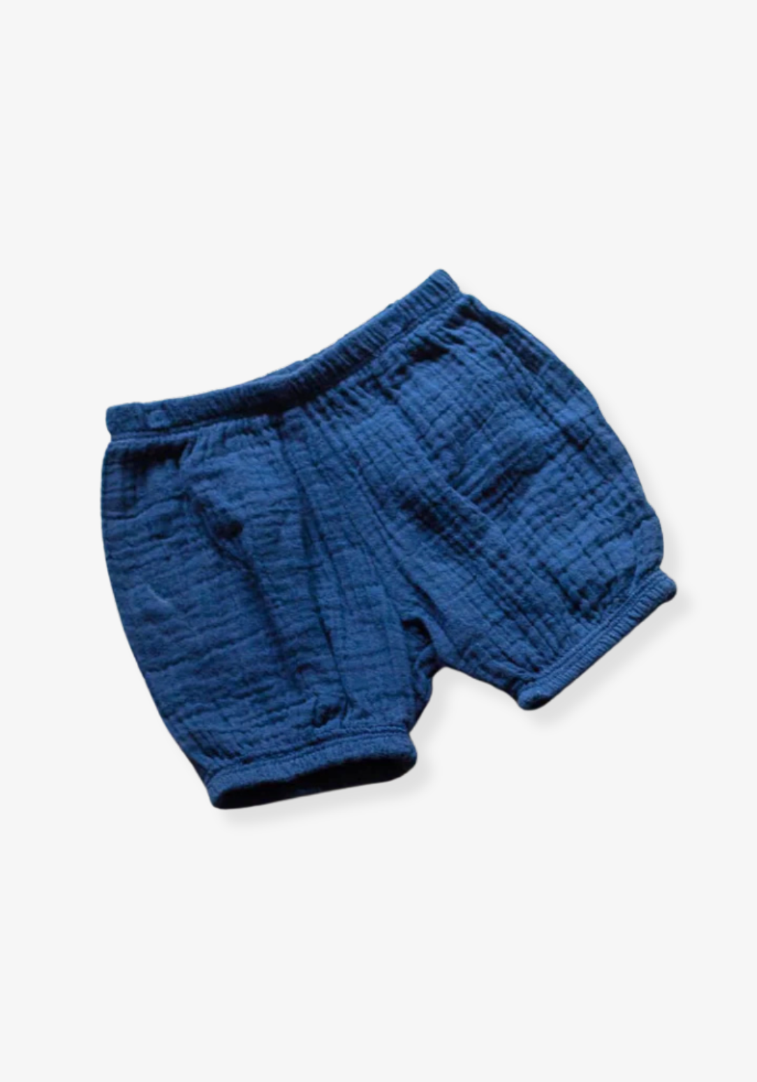 Navy blue organic cotton baby bloomers with soft elastic waist and leg openings.