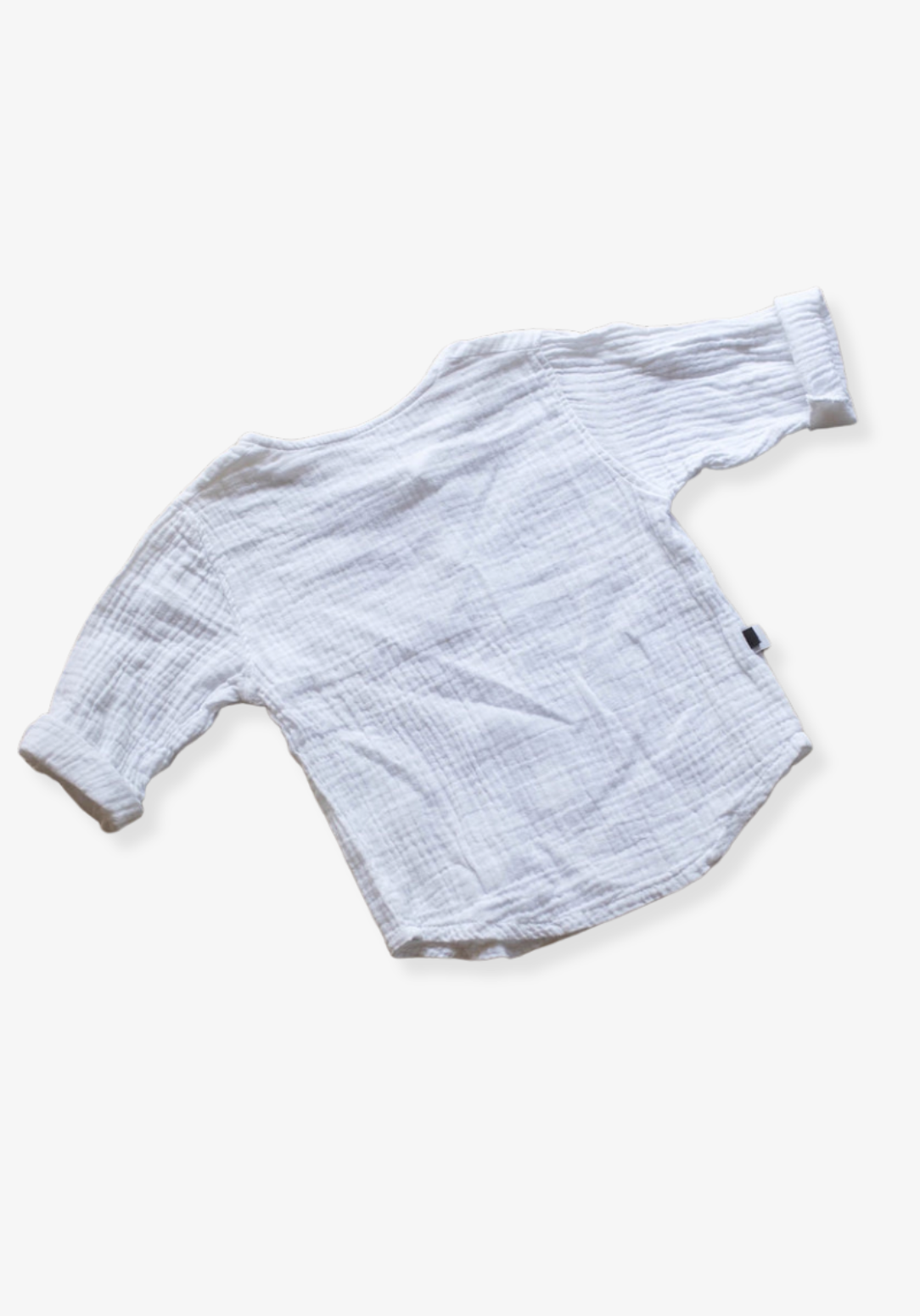 White island-style toddler shirt made of organic cotton, perfect for beachwear or everyday comfort.
