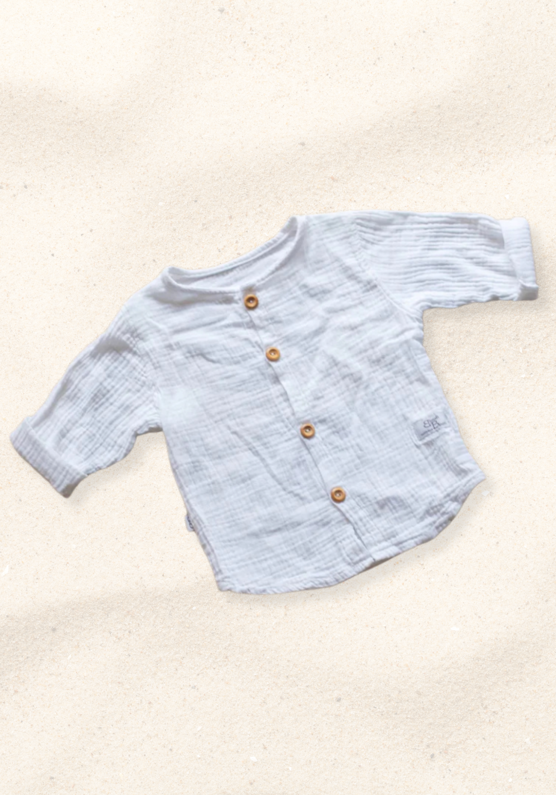 White island-style toddler shirt made of organic cotton, perfect for beachwear or everyday comfort.