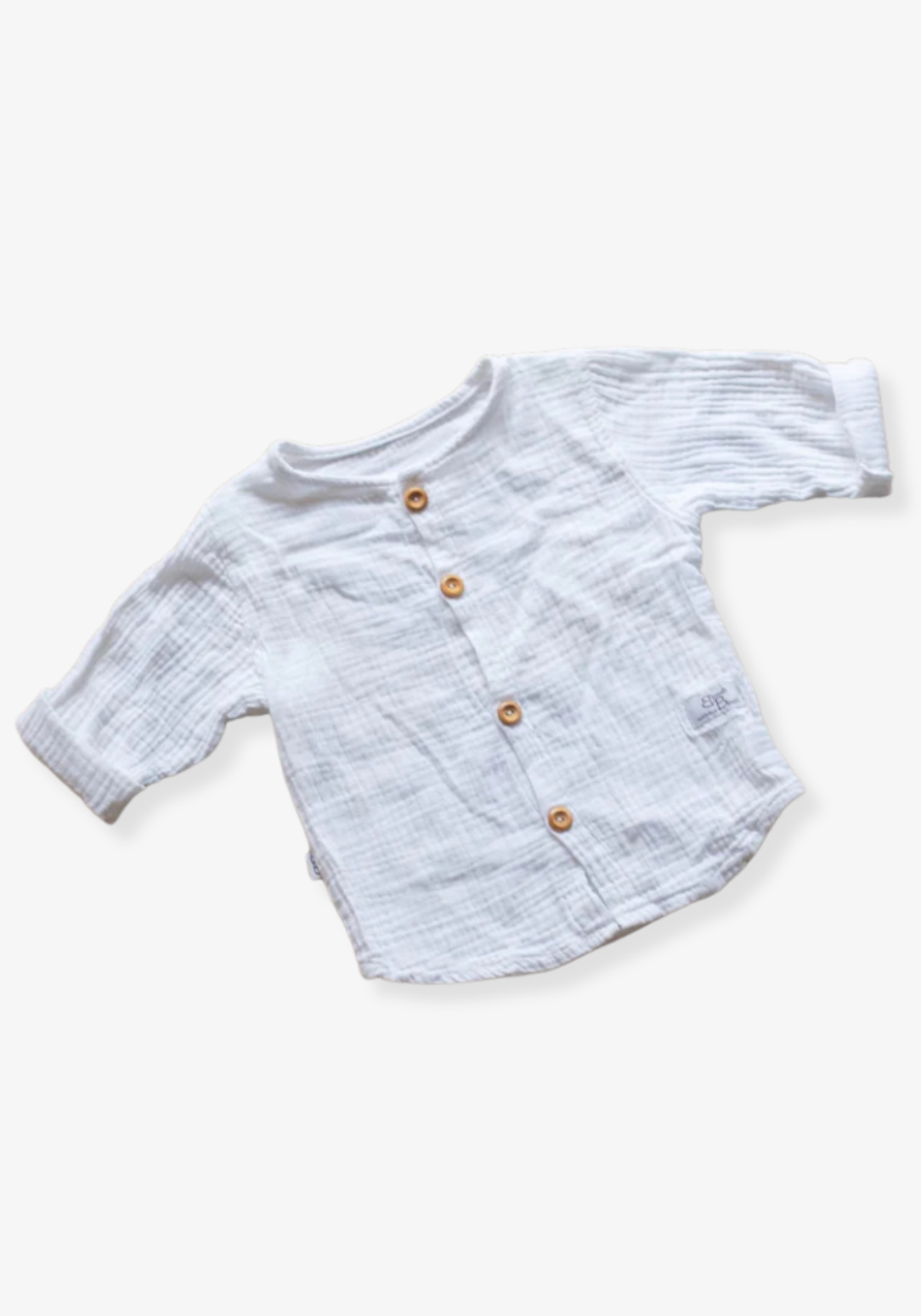 White island-style toddler shirt made of organic cotton, perfect for beachwear or everyday comfort.