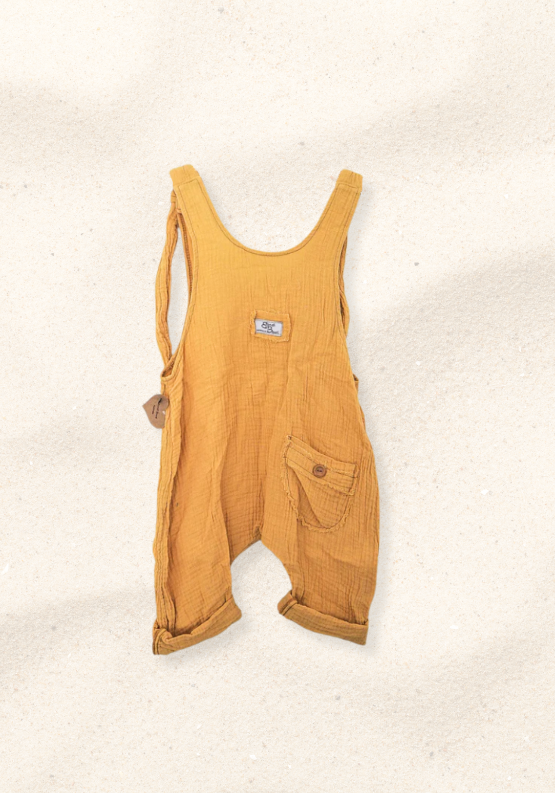 Organic cotton mustard yellow toddler dungarees with front pocket detail