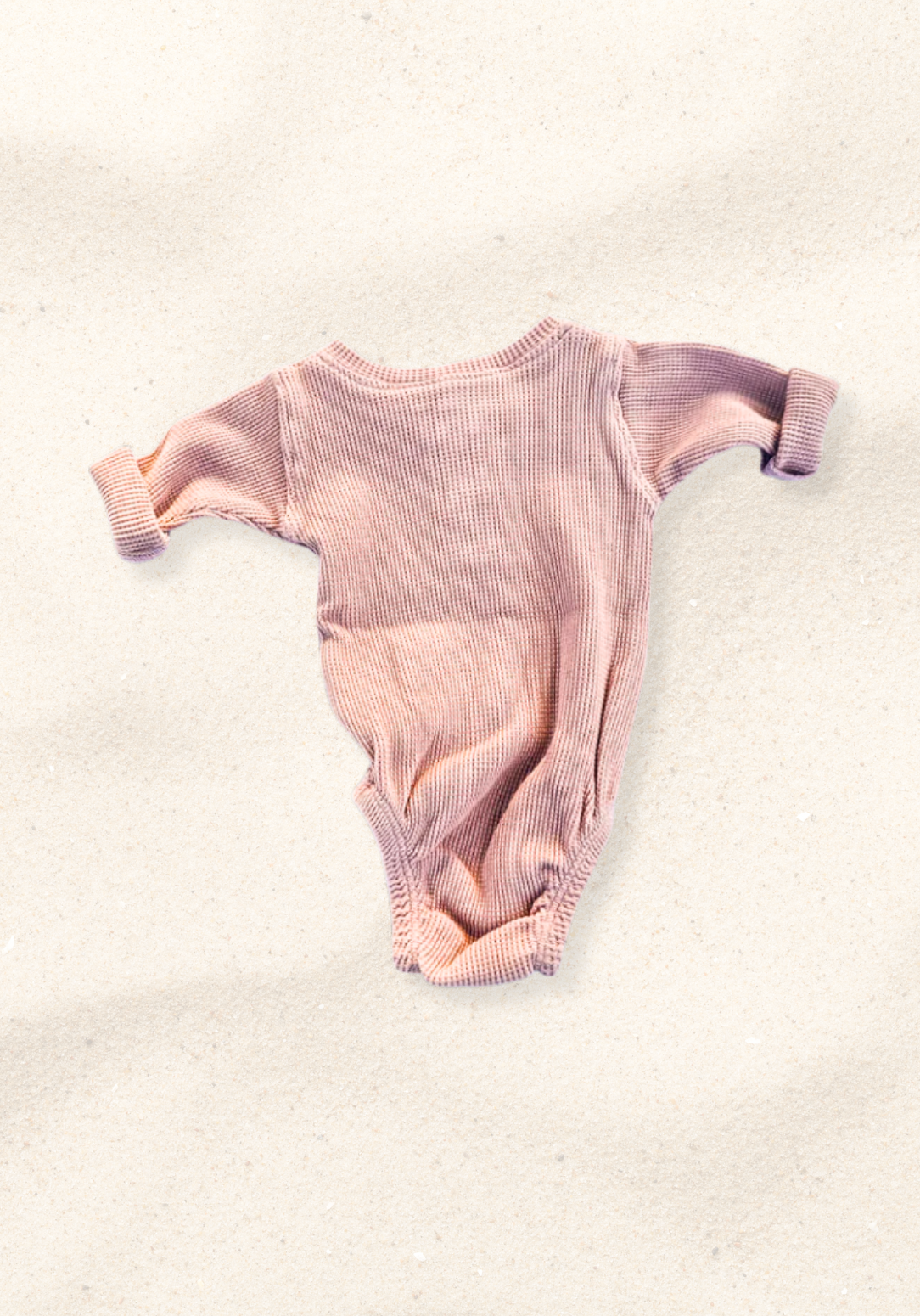 waffle knit long sleeve baby bodysuit with soft organic cotton texture and convenient snap buttons