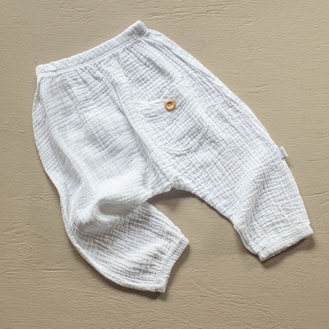 soft organic cotton neutral baby and toddler harem pants white